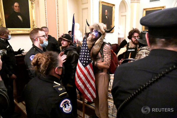 police confront supporters of president trump as they demonstrate on the second floor of the us capitol near the entrance to the senate after breaching security defenses photo reuters