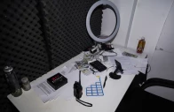 a small booth lined with acoustic foam used to make scam calls to victims and containing scripts for scam dialogues and counterfeit u s 100 dollar banknotes is seen inside a scam compound known as my casino used for fraud operations photo reuters