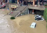 cars lie partially submerged in floodwaters after heavy rainfall in duyun guizhou province china may 19 2026 in this still image obtained from a social media video photo reuters