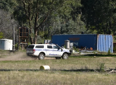 australian police believe fugitive accused of killing two officers shot dead