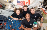 the nasa artemis ii crew mission specialist christina koch mission specialist jeremy hansen commander reid wiseman and pilot victor glover pose for a group photo inside the orion spacecraft on their way home following a flyby of the far side of the moon on april 6 2026 photo reuters