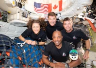 the nasa artemis ii crew mission specialist christina koch mission specialist jeremy hansen commander reid wiseman and pilot victor glover pose for a group photo inside the orion spacecraft on their way home following a flyby of the far side of the moon on april 6 2026 photo reuters