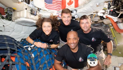 the nasa artemis ii crew mission specialist christina koch mission specialist jeremy hansen commander reid wiseman and pilot victor glover pose for a group photo inside the orion spacecraft on their way home following a flyby of the far side of the moon on april 6 2026 photo reuters