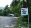 this photograph taken on march 26 2026 shows a board marking a tribal reserve area on the outskirts of campbell bay at great nicobar island photo afp