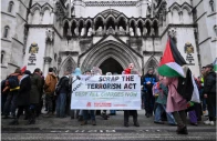 people protest outside the high court as judges prepare to rule on a legal challenge to the british government s decision to designate pro palestinian group palestine action as a terrorist organisation in london britain february 13 2026 photo reuters people protest outside the high court as judges prepare to rule on a legal challenge to the british government s decision to designate pro palestinian group palestine action as a terrorist organisation in london britain february 13 2026 photo reuters