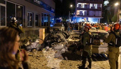 soldiers inspect an apartment damaged by a missile strike is seen in ramat gan in the outskirts of tel aviv israel on march 18 2026 photo afp