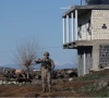 a turkish soldier stands guard as army and security personnel search a field after a piece of ammunition fell following the interception of a missile launched from iran by a nato air defence system in diyarbakir turkey march 9 2026 photo reuters