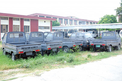 parked in the open rusting away under sun and rain