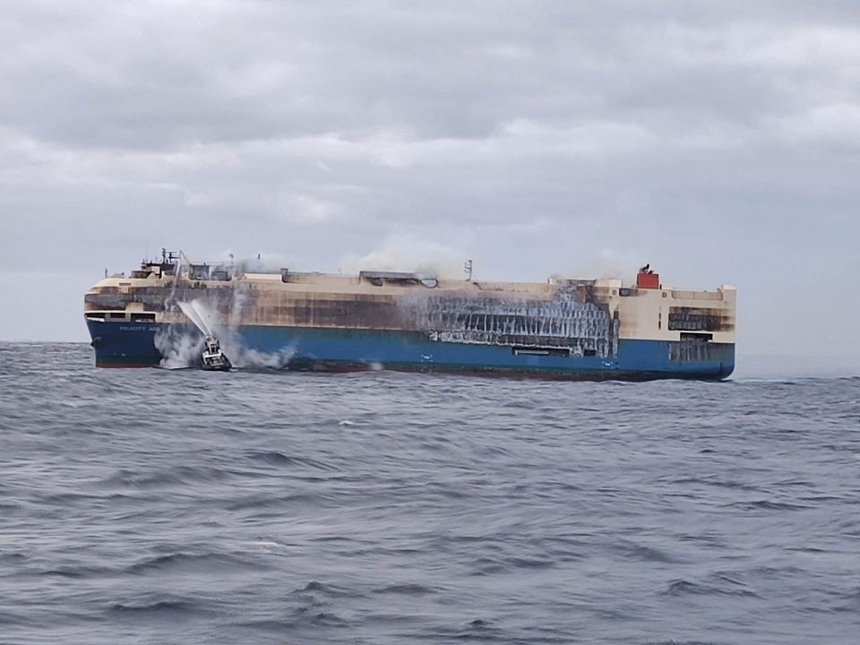 Photo of Ship carrying Porsches and Bentleys ablaze near Azores, towing boats en route