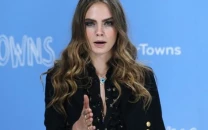 cara delevingne reveals she felt like an undercover lesbian at victoria s secret