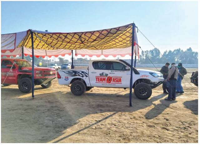 inspectors check a vehicle in di khan which will participate in the off road competition photo express inspectors check a vehicle in di khan which will participate in the off road competition photo express