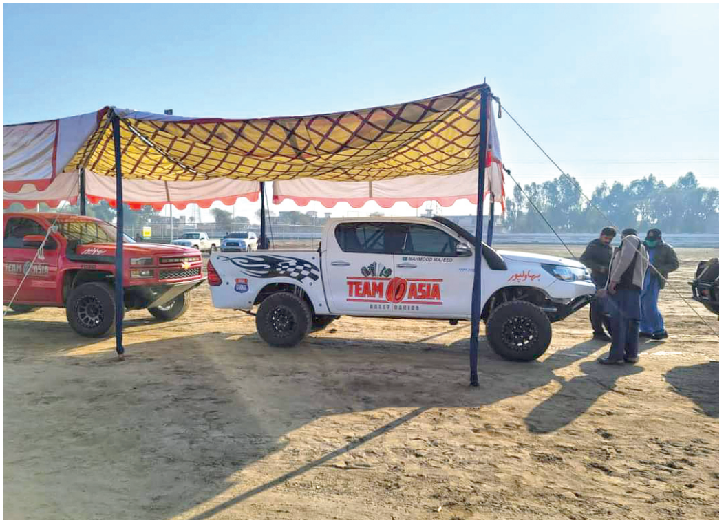 inspectors check a vehicle in di khan which will participate in the off road competition photo express