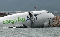 two killed as cargo jet crashes off runway into sea at hong kong airport two killed as cargo jet crashes off runway into sea at hong kong airport