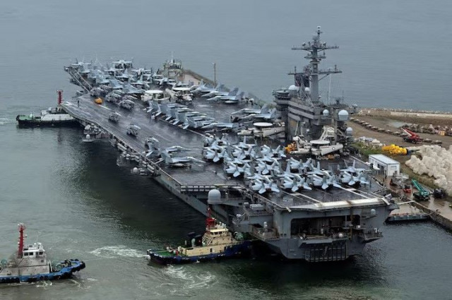 the theodore roosevelt cvn 71 a nuclear powered aircraft carrier is anchored in busan south korea june 22 2024 photo reuters the theodore roosevelt cvn 71 a nuclear powered aircraft carrier is anchored in busan south korea june 22 2024 photo reuters