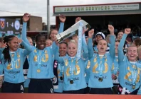 manchester city s alex greenwood lifts the trophy as she celebrates with teammates after winning the women s super league photo reuters