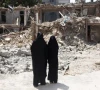 iranian women look at a building which was damaged in a us and israeli strike in march in tehran iran august 22 2026 reuters