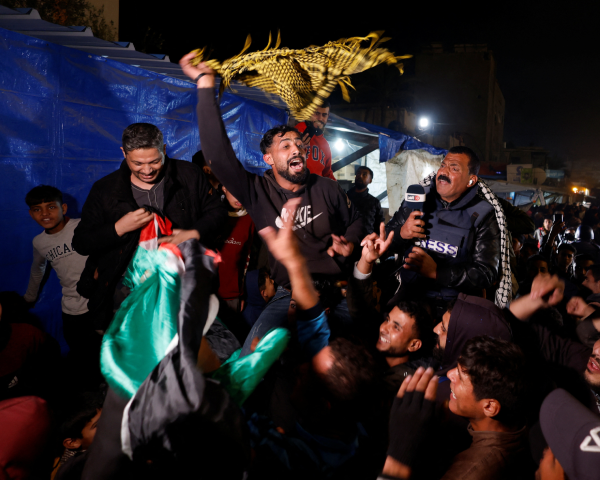 palestinians in khan younis southern gaza react to news reports that a ceasefire deal has been agreed to by israel and hamas photo reuters