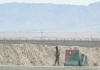 a pakistani security personnel stands guard at the border along afghanistan in chaman following overnight clashes between forces of the two countries photo afp