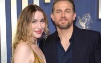charlie hunnam uses wife while discussing morgana mcnelis at 2026 critics choice awards