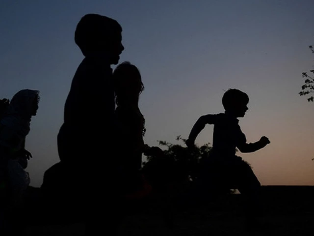 in this picture taken on march 25 2021 children play at subhani shar village near rato dero in sindh province photo afp