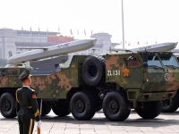 a member of the people s liberation army stands as strategic strike group displays yj 18c cruise missiles during a military parade to mark the 80th anniversary of the end of world war two in beijing china september 3 2025 photo reuters