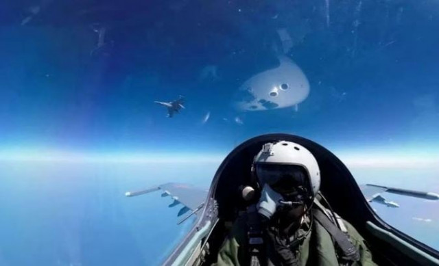 a pilot is photographed operating an aircraft of the air force under the eastern theatre command of china s people s liberation army pla during a combat readiness patrol and joint sword exercises around taiwan at an undisclosed location in this handout image released on april 8 2023 photo reuters a pilot is photographed operating an aircraft of the air force under the eastern theatre command of china s people s liberation army pla during a combat readiness patrol and joint sword exercises around taiwan at an undisclosed location in this handout image released on april 8 2023 photo reuters