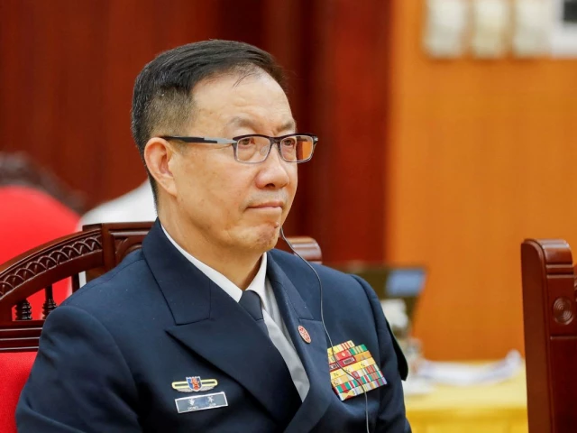 chinese minister of national defense dong jun attends a meeting at the office of the party central committee in hanoi vietnam monday april 14 2025 photo reuters chinese minister of national defense dong jun attends a meeting at the office of the party central committee in hanoi vietnam monday april 14 2025 photo reuters
