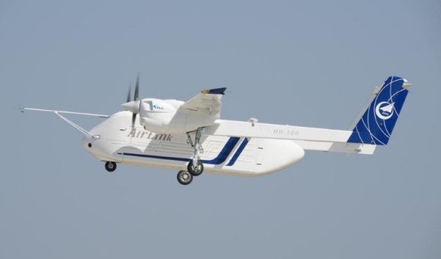 a demonstrator of china s hh 100 aerial commercial unmanned transportation system is pictured during its maiden flight at a general aviation airport in xi an northwest china s shaanxi province june 12 2024 photo xinua news a demonstrator of china s hh 100 aerial commercial unmanned transportation system is pictured during its maiden flight at a general aviation airport in xi an northwest china s shaanxi province june 12 2024 photo xinua news