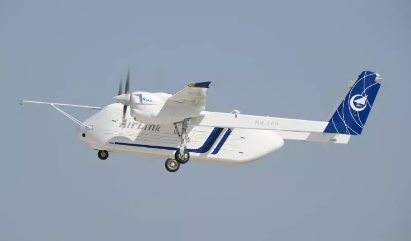a demonstrator of china s hh 100 aerial commercial unmanned transportation system is pictured during its maiden flight at a general aviation airport in xi an northwest china s shaanxi province june 12 2024 photo xinua news a demonstrator of china s hh 100 aerial commercial unmanned transportation system is pictured during its maiden flight at a general aviation airport in xi an northwest china s shaanxi province june 12 2024 photo xinua news