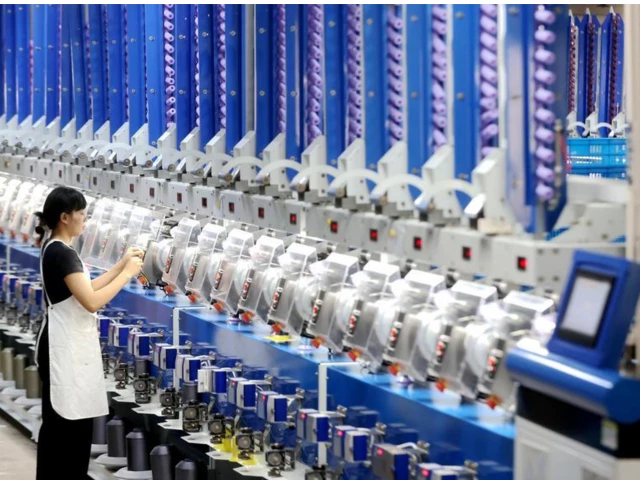 a worker checks automatic spool winders at a smart factory in xin an town deqing county zhejiang province china on june 15 2026 photo xinhua a worker checks automatic spool winders at a smart factory in xin an town deqing county zhejiang province china on june 15 2026 photo xinhua