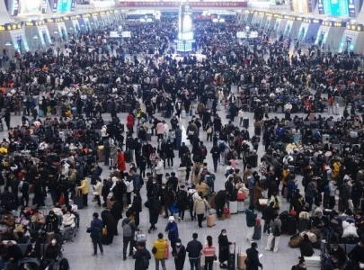 china plays down covid outbreak with holiday rush at full tilt china plays down covid outbreak with holiday rush at full tilt