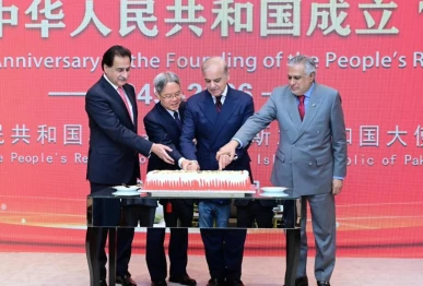prime minister shehbaz sharif cuts a cake with chinese ambassador jiang zaidong during a ceremony marking the 77th anniversary of the founding of the people s republic of china photo pmo