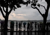 people use umbrellas in the rain by west lake after a rainstorm warning was issued for the area in hangzhou zhejiang province china july 21 2026 photo reuters people use umbrellas in the rain by west lake after a rainstorm warning was issued for the area in hangzhou zhejiang province china july 21 2026 photo reuters