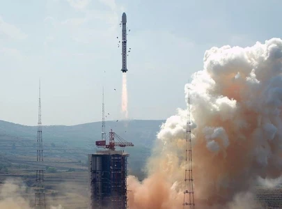 china launches twin satellites into space