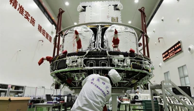 a technician checks the solar wind magnetosphere ionosphere link explorer smile at a workshop of the innovation academy for microsatellites of chinese academy of sciences cas in shanghai east china nov 4 2024 the smile is a joint mission between the cas and the european space agency esa that aims to deepen the understanding of the sun earth connection photo xinhua