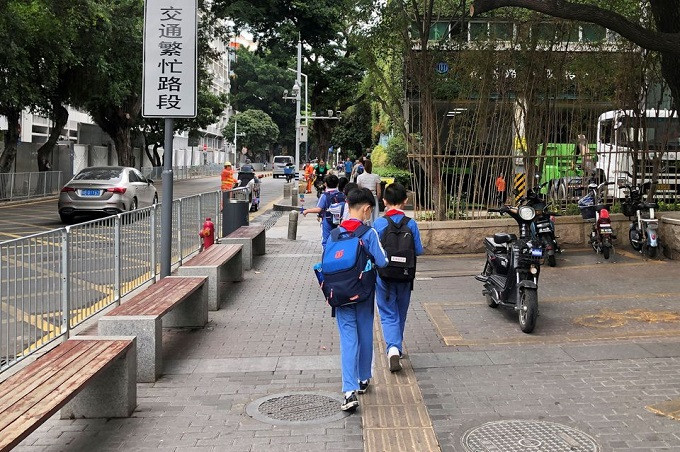 children leave a school in shekou area of shenzhen guangdong province china april 20 2021 reuters david kirton