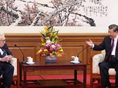 china s xi gets nostalgic with old friend kissinger
