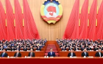 china plans deeper fight against corruption with cross border law