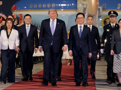 trump lands in beijing for high stakes china visit