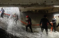 participants practice evacuating an underground facility during a typhoon survival training session at the lvxing disaster simulation training centre in hangzhou zhejiang province china july 15 2026 photo reuters participants practice evacuating an underground facility during a typhoon survival training session at the lvxing disaster simulation training centre in hangzhou zhejiang province china july 15 2026 photo reuters