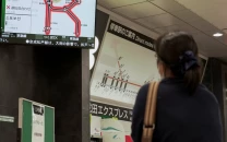 thousands stranded at japan s narita airport after record rain kills four