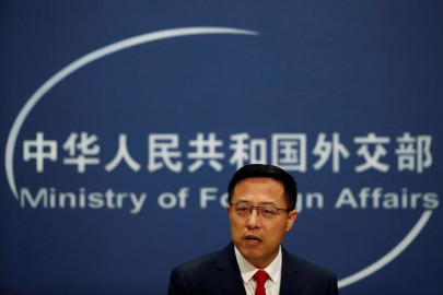 china denies that us diplomats were required to take anal swab tests for covid 19