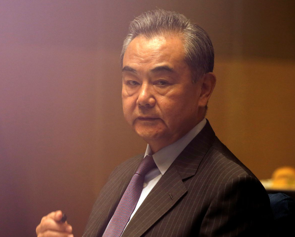 china s foreign minister wang yi listens during a meeting in manila philippines january 16 2021 francis malasig pool via reuters file photo