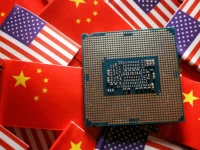 a central processing unit semiconductor chip is displayed among flags of china and us in this illustration picture taken february 17 2023 photo reuters