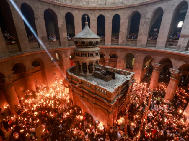 people gather at the church of the holy sepulchre on the day of the holy fire ceremony in jerusalem s old city photo reuters people gather at the church of the holy sepulchre on the day of the holy fire ceremony in jerusalem s old city photo reuters