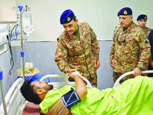 field marshal gen syed asim munir enquires after the health of a soldier during his visit to cmh peshawar photo ispr field marshal gen syed asim munir enquires after the health of a soldier during his visit to cmh peshawar photo ispr