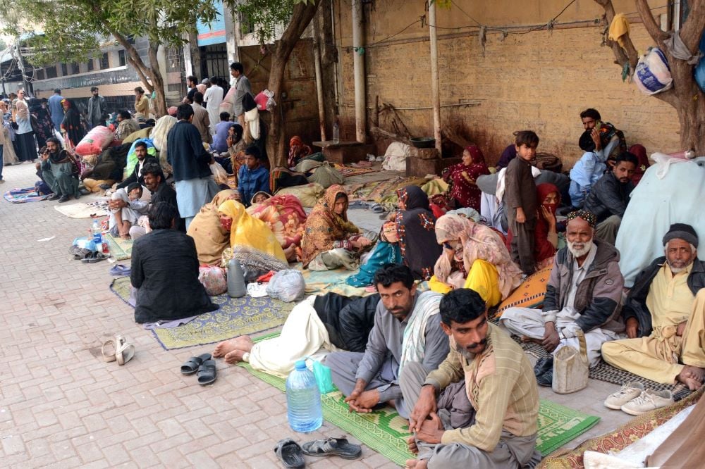 patient s relatives are sitting outside the civil hospital karachi photo by jalal qureshi express