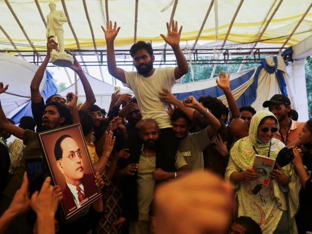 abhijeet dipke head of the cockroach janta party celebrates with supporters after the resignation of education minister dharmendra pradhan at jantar mantar in new delhi india july 25 2026 photo reuters abhijeet dipke head of the cockroach janta party celebrates with supporters after the resignation of education minister dharmendra pradhan at jantar mantar in new delhi india july 25 2026 photo reuters