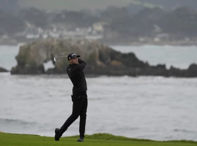 clark wins third pga title as storms end pebble beach early