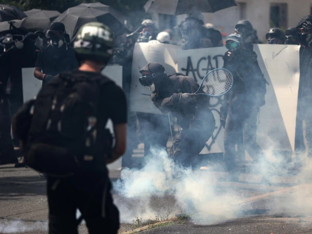 some marchers appeared to be equipped for a showdown with police in maurens scopont southwest france on saturday photo afp some marchers appeared to be equipped for a showdown with police in maurens scopont southwest france on saturday photo afp